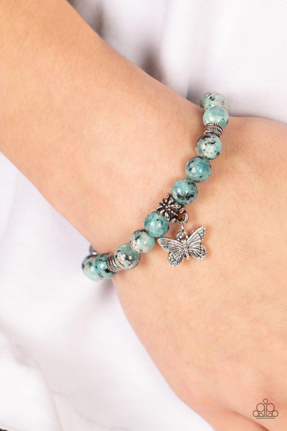 Butterfly Nirvana Blue Stone Butterfly Bracelet - Paparazzi Accessories- on model - CarasShop.com - Paparazzi Jewelry by Cara Jewels
