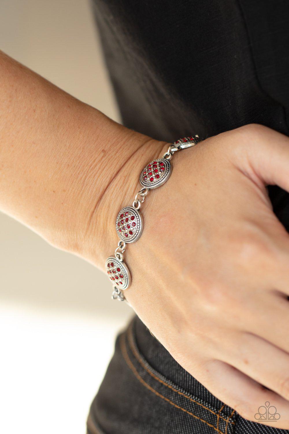 By Royal Decree Red Rhinestone and Silver Bracelet - Paparazzi Accessories- on model - CarasShop.com - Paparazzi Jewelry by Cara Jewels