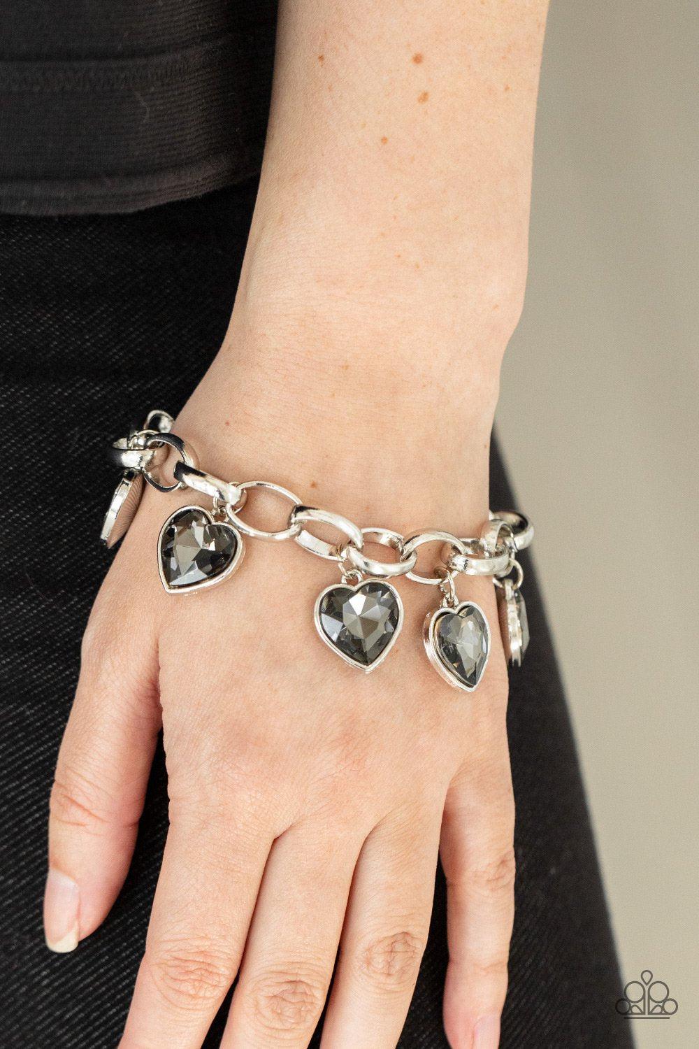 Candy Heart Charmer Silver Rhinestone Heart Charm Bracelet - Paparazzi Accessories- on model - CarasShop.com - Paparazzi Jewelry by Cara Jewels