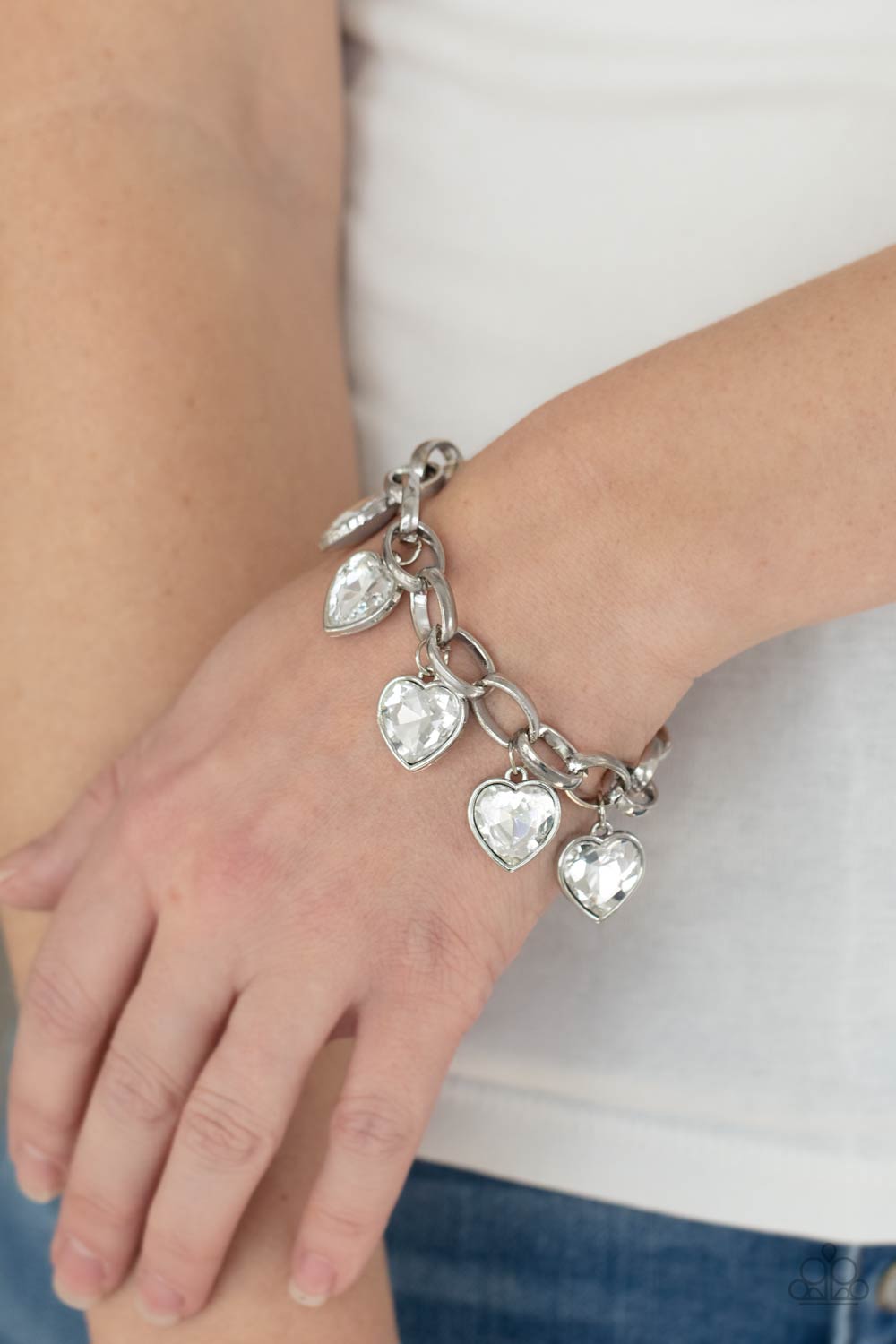 Candy Heart Charmer White Rhinestone Heart Charm Bracelet - Paparazzi Accessories- on model - CarasShop.com - Paparazzi Jewelry by Cara Jewels