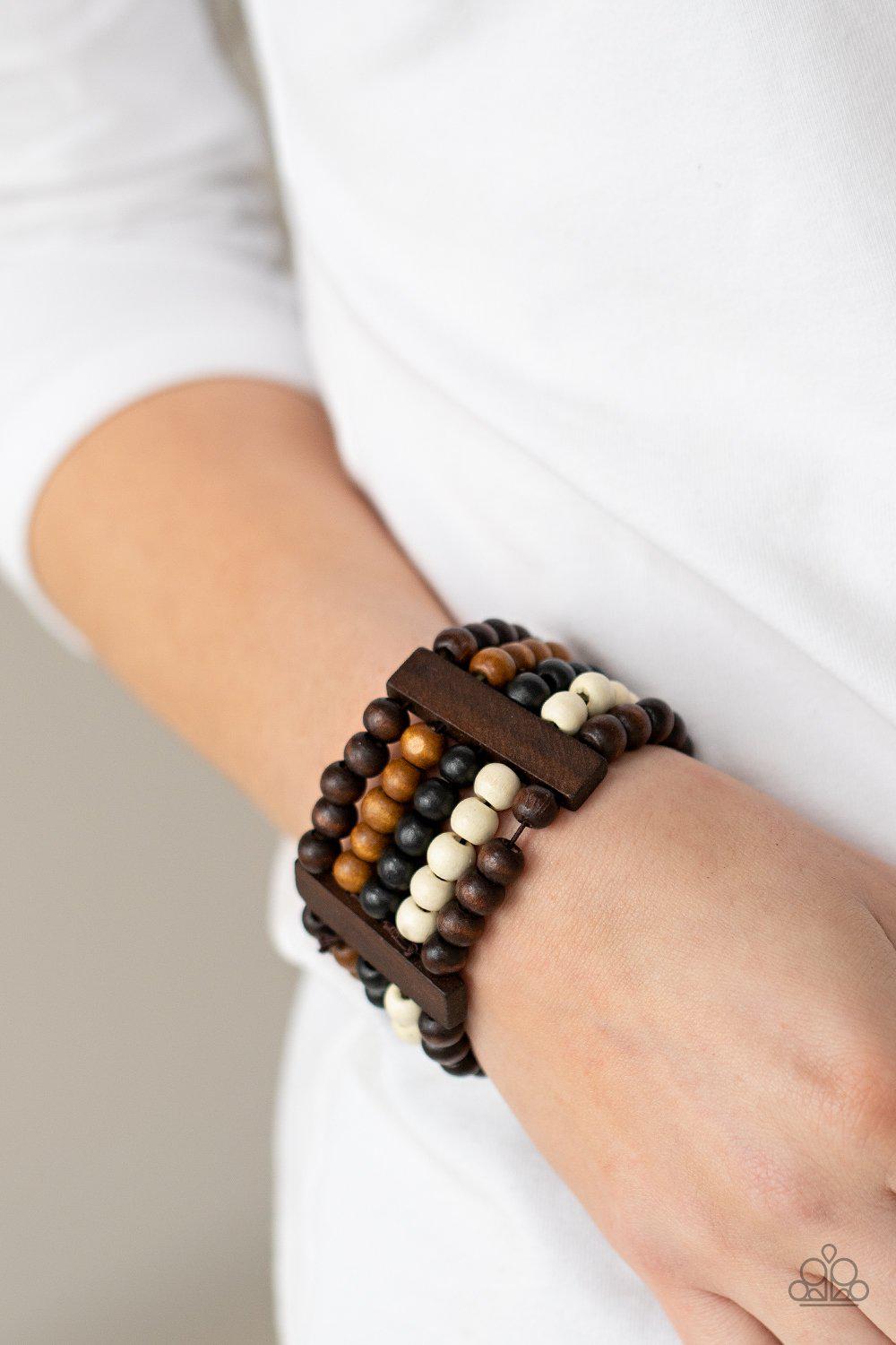 Caribbean Catwalk Multi Brown, Black and White Wood Bracelet - Paparazzi Accessories- on model - CarasShop.com - Paparazzi Jewelry by Cara Jewels
