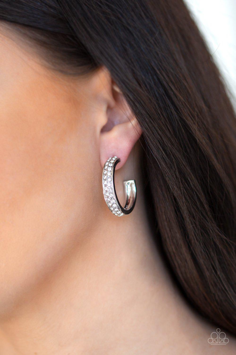 Cash Flow White Rhinestone Hoop Earrings - Paparazzi Accessories- on model - CarasShop.com - Paparazzi Jewelry by Cara Jewels