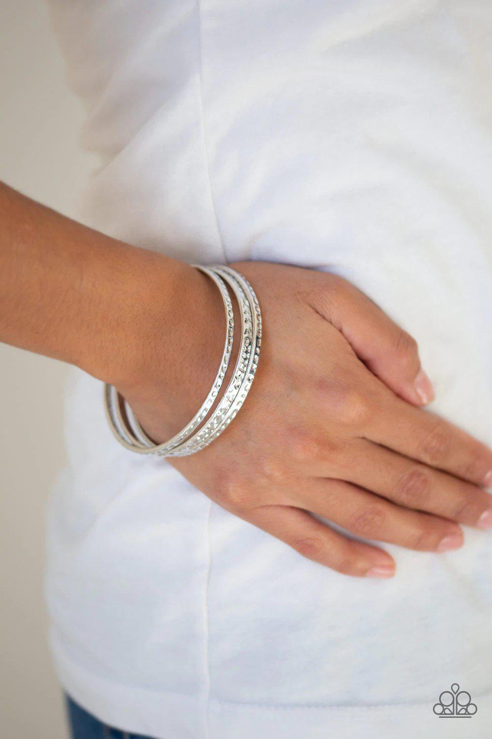Casually Couture Silver Bangle Bracelet - Paparazzi Accessories- on model - CarasShop.com - Paparazzi Jewelry by Cara Jewels