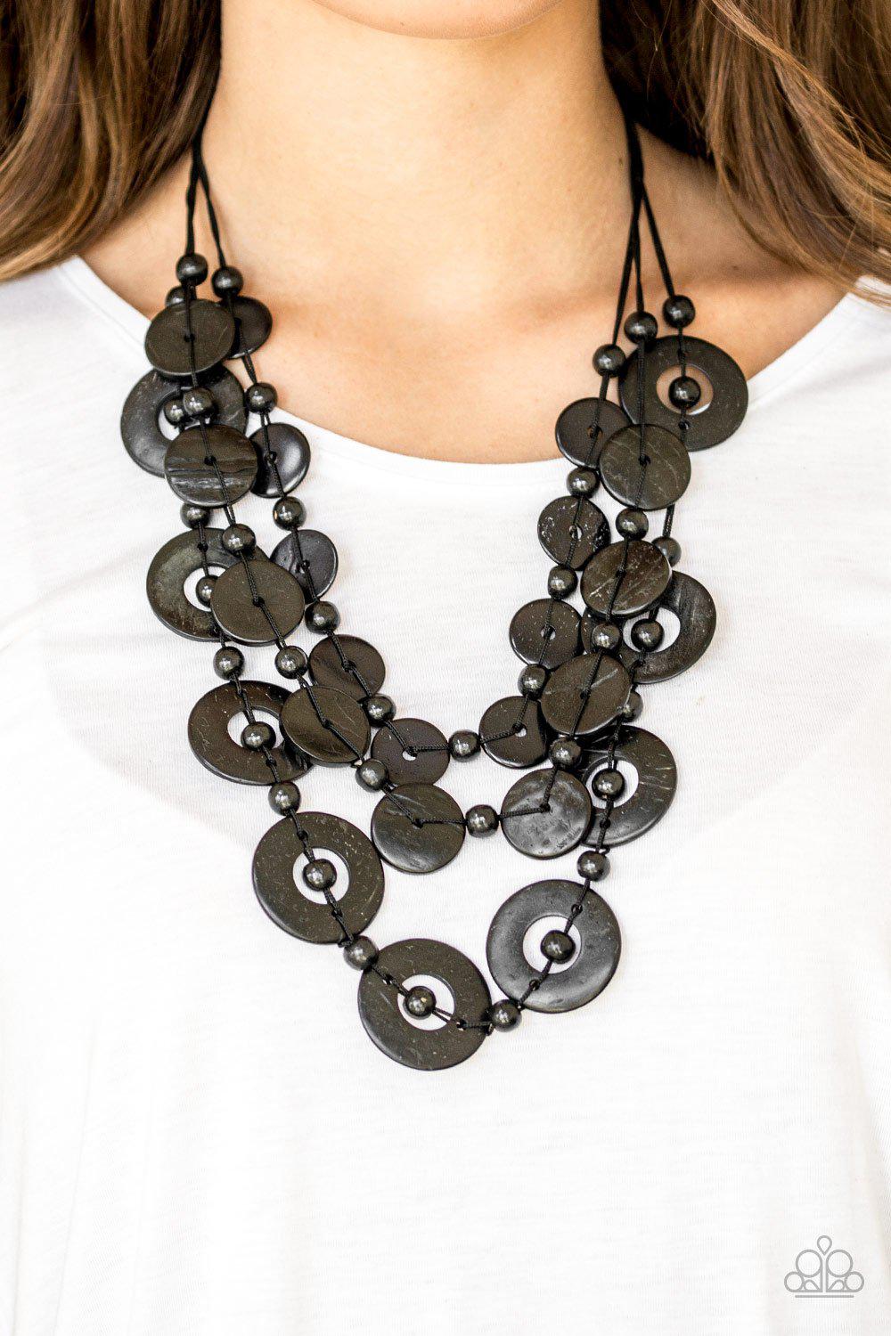 Catalina Coastin' Black Wood Necklace - Paparazzi Accessories- on model - CarasShop.com - Paparazzi Jewelry by Cara Jewels