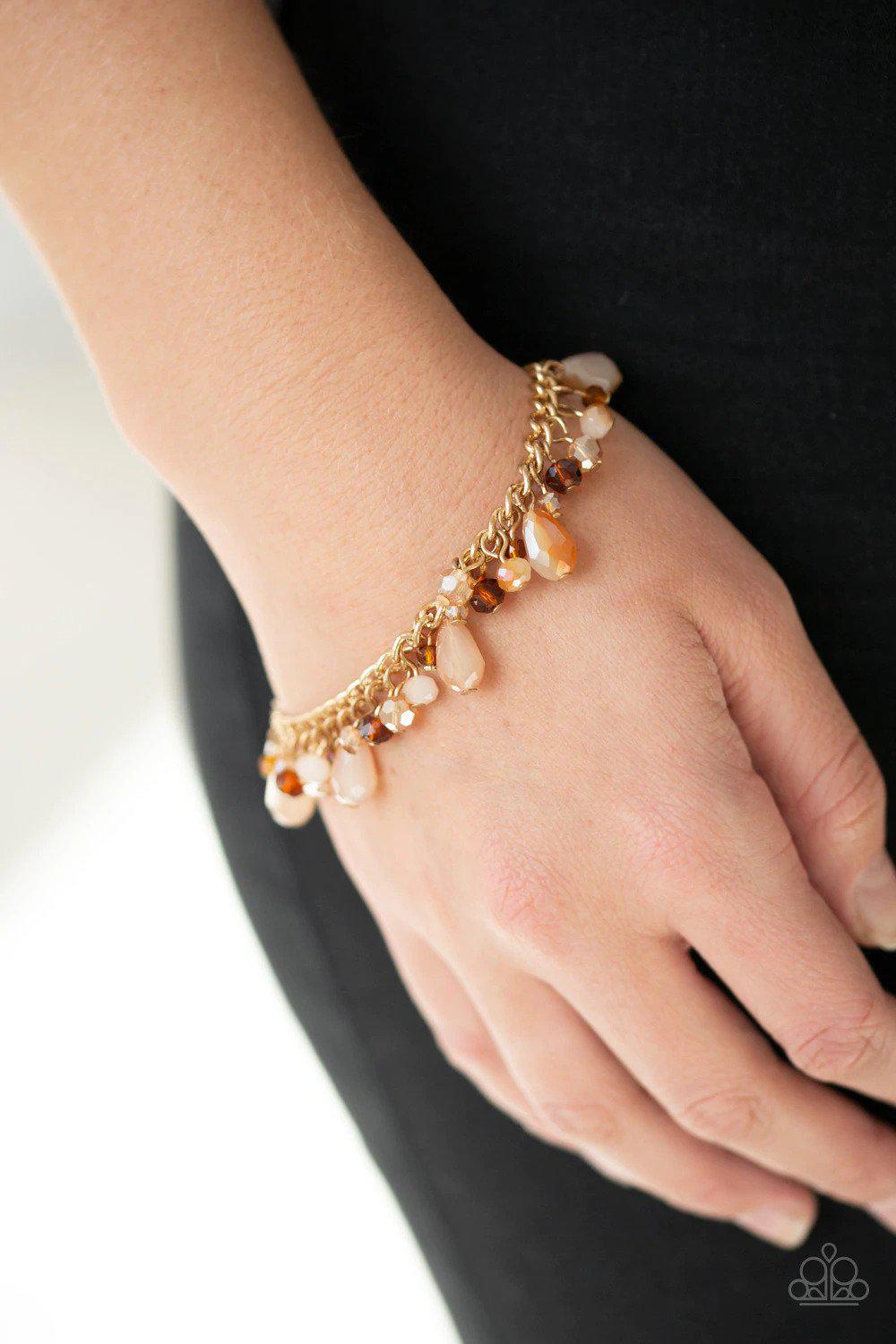 Catwalk Crawl Gold Bracelet - Paparazzi Accessories- on model - CarasShop.com - Paparazzi Jewelry by Cara Jewels