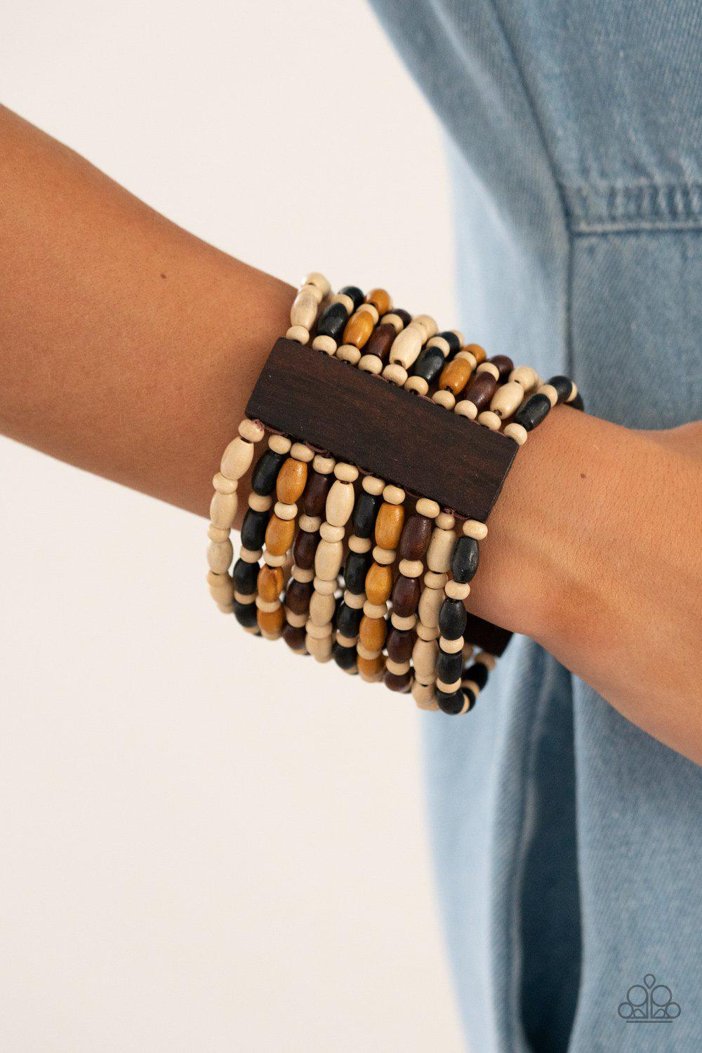 Cayman Carnival Multi Black, Brown and White Wood Bracelet - Paparazzi Accessories- on model - CarasShop.com - Paparazzi Jewelry by Cara Jewels