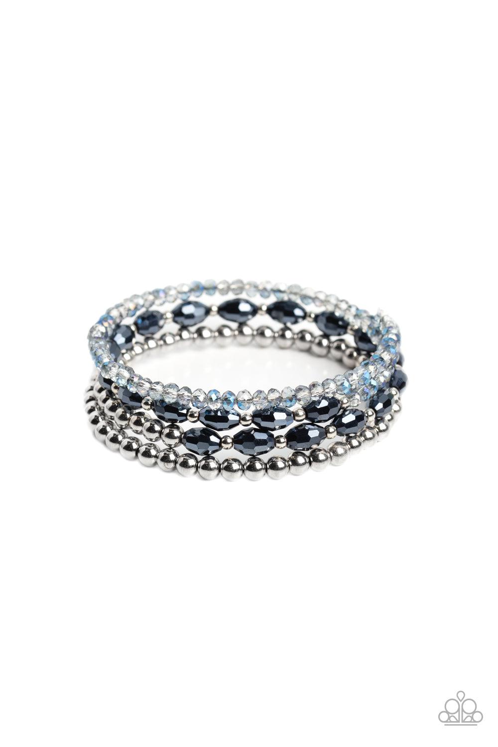 Celestial Chapter Blue Coil Bracelet - Paparazzi Accessories- lightbox - CarasShop.com - Paparazzi Jewelry by Cara Jewels