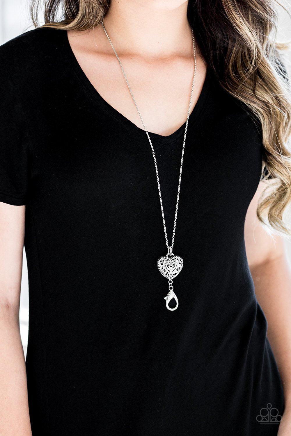 Charmingly Casanova White Heart Lanyard Necklace - Paparazzi Accessories- on model - CarasShop.com - Paparazzi Jewelry by Cara Jewels