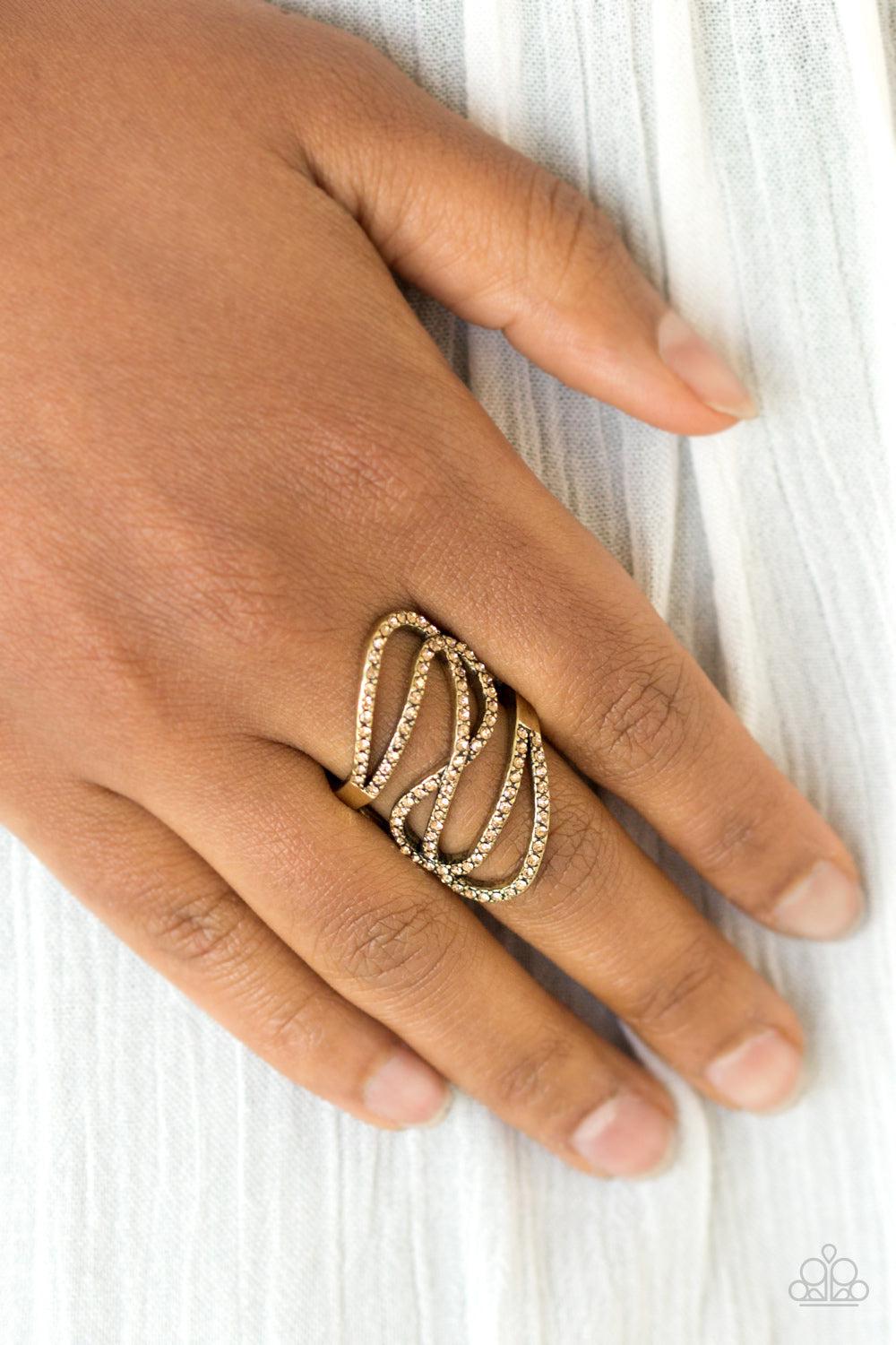 Chasing Starlight Brass Ring - Paparazzi Accessories- on model - CarasShop.com - Paparazzi Jewelry by Cara Jewels