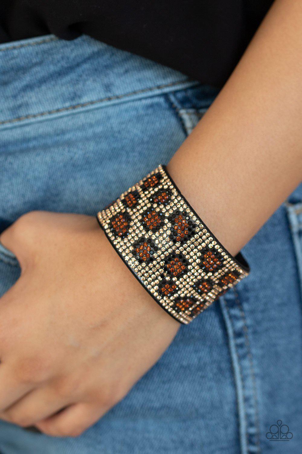 Cheetah Couture Brown Animal Print Rhinestone Wrap Snap Bracelet - Paparazzi Accessories- on model - CarasShop.com - Paparazzi Jewelry by Cara Jewels
