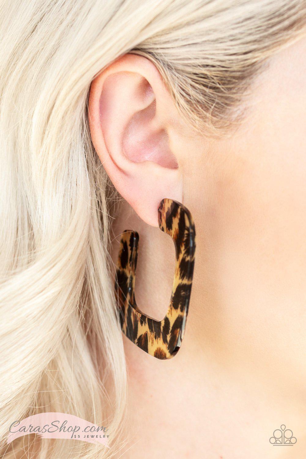 Cheetah Incognita Acrylic Hoop Earrings - Paparazzi Accessories- on model - CarasShop.com - Paparazzi Jewelry by Cara Jewels