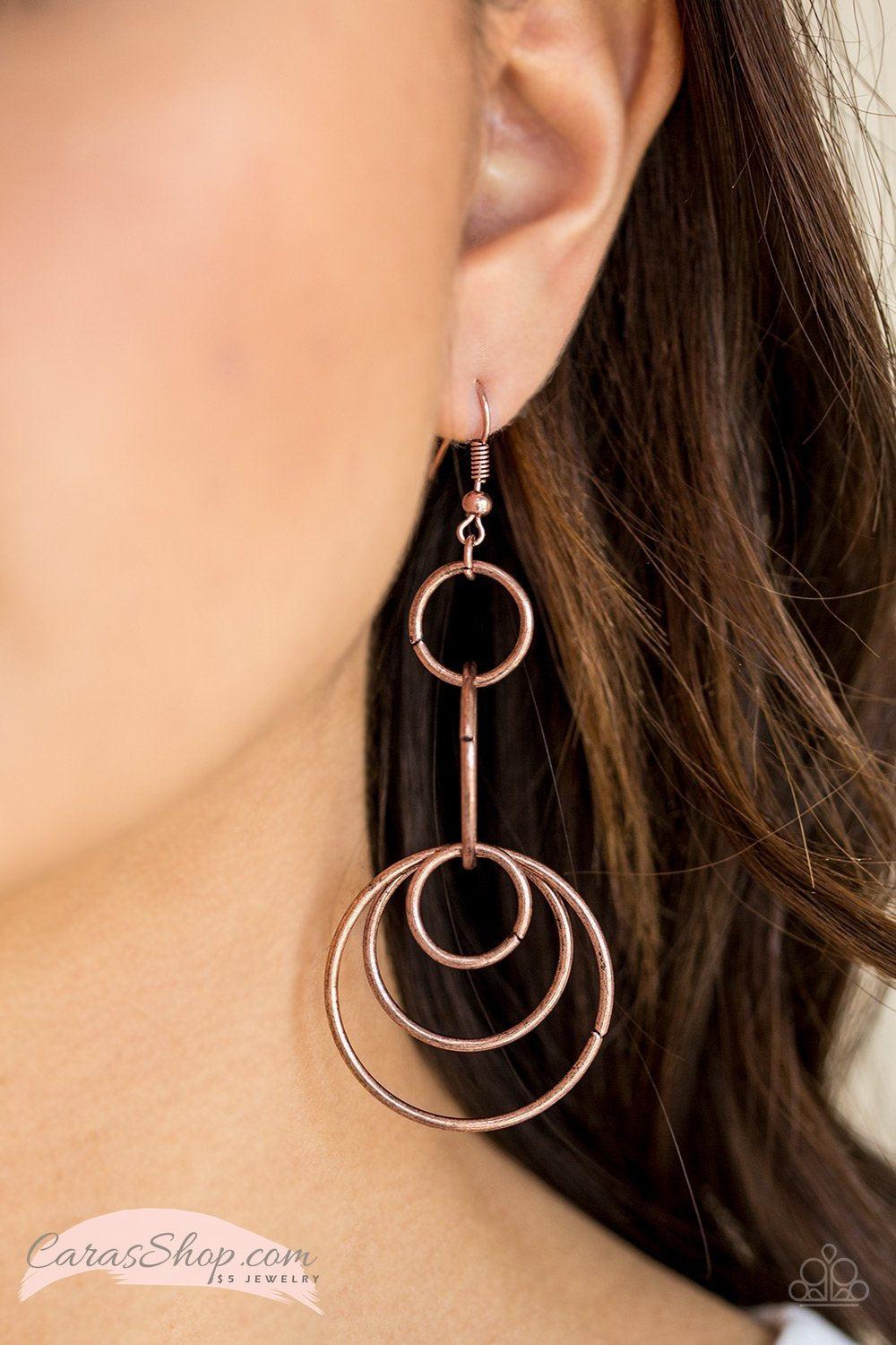 Chic Circles Copper Earrings - Paparazzi Accessories- on model - CarasShop.com - Paparazzi Jewelry by Cara Jewels