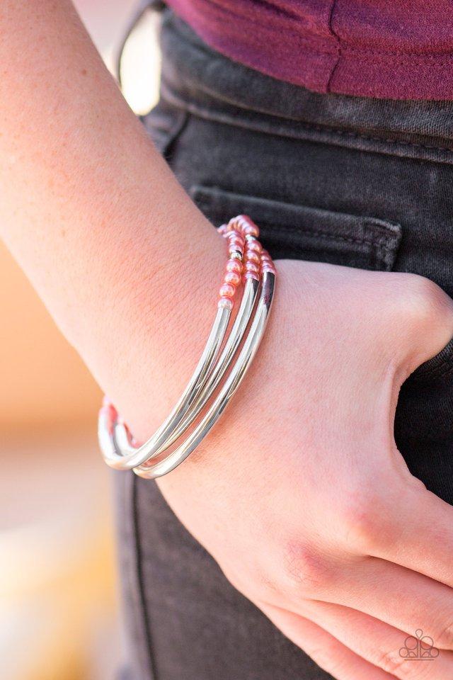 City Pretty Coral and Silver Bracelet Set - Paparazzi Accessories- on model - CarasShop.com - Paparazzi Jewelry by Cara Jewels