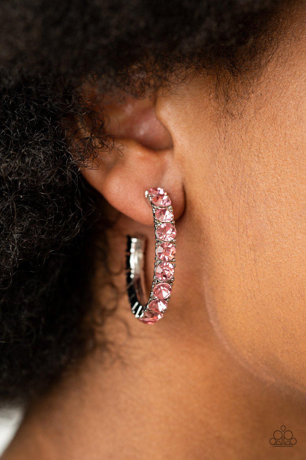 CLASSY is in Session Pink Rhinestone Hoop Earrings - Paparazzi Accessories- on model - CarasShop.com - Paparazzi Jewelry by Cara Jewels
