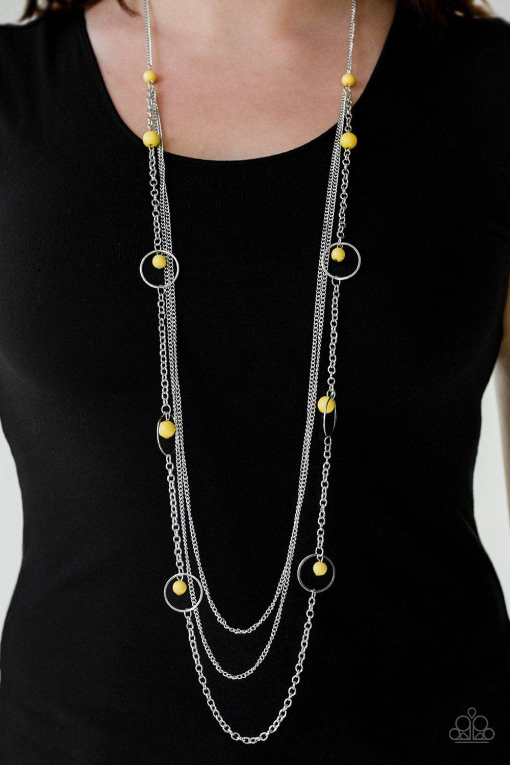 Collectively Carefree Silver and Yellow Necklace - Paparazzi Accessories- on model - CarasShop.com - Paparazzi Jewelry by Cara Jewels