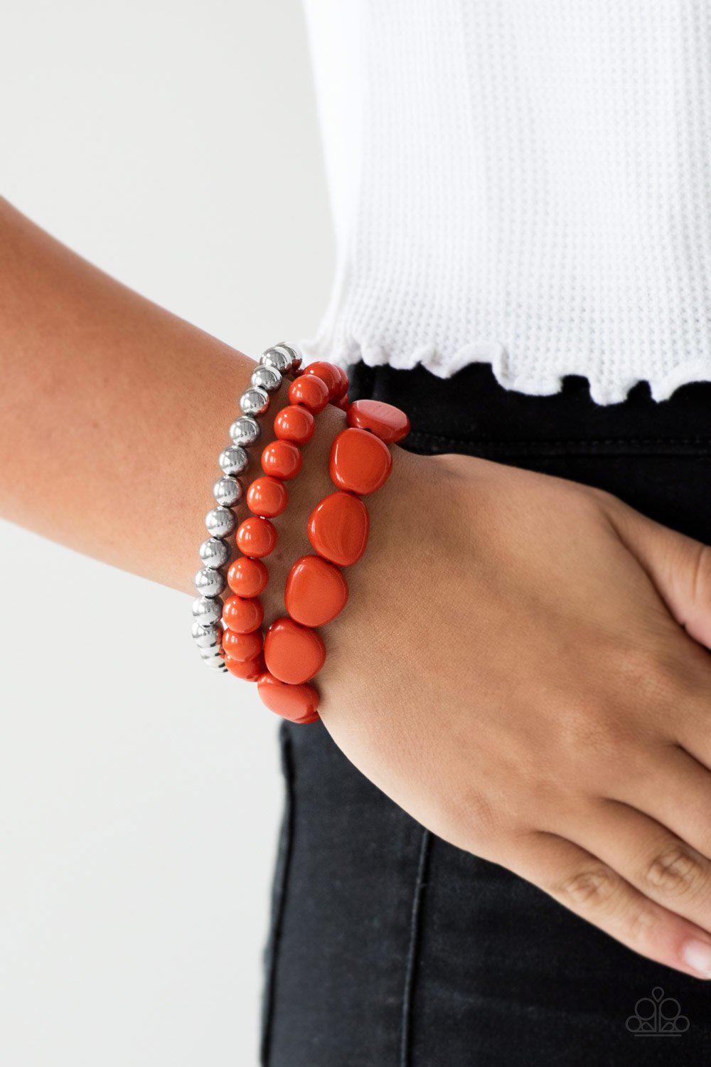 Color Venture Silver and Orange Bracelet Set - Paparazzi Accessories- on model - CarasShop.com - Paparazzi Jewelry by Cara Jewels