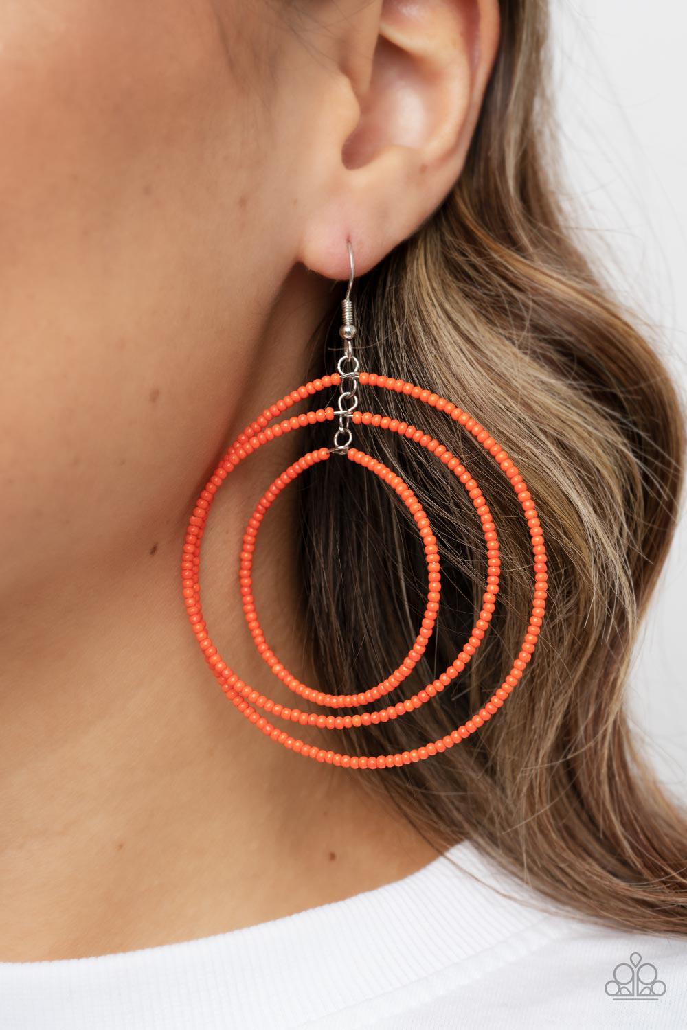Colorfully Circulating Orange Seed Bead Earrings - Paparazzi Accessories- on model - CarasShop.com - Paparazzi Jewelry by Cara Jewels