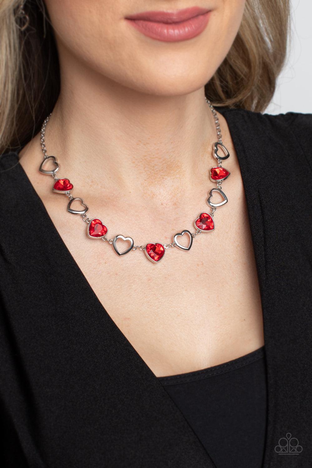 Contemporary Cupid Red Heart Necklace - Paparazzi Accessories- on model - CarasShop.com - Paparazzi Jewelry by Cara Jewels