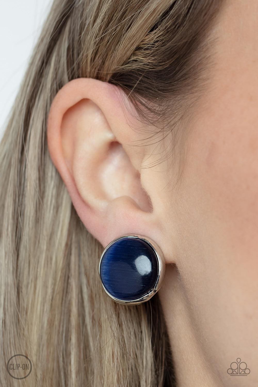 Cool Pools Blue Cat's Eye Stone Clip-On Earrings - Paparazzi Accessories- on model - CarasShop.com - Paparazzi Jewelry by Cara Jewels