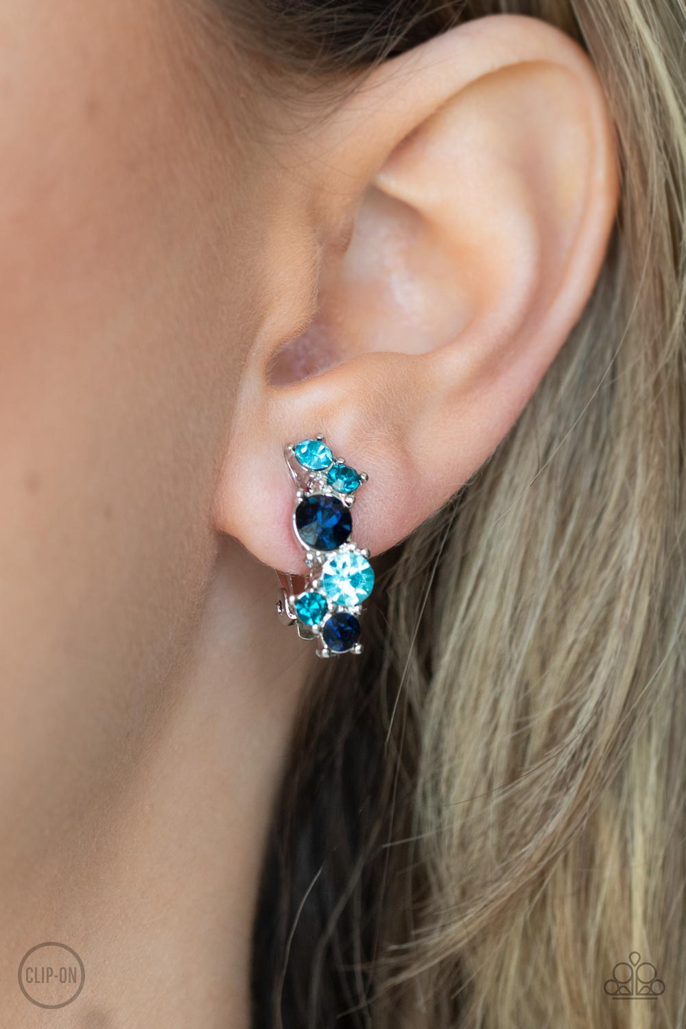Cosmic Celebration Blue Rhinestone Clip-on Earrings - Paparazzi Accessories- lightbox - CarasShop.com - Paparazzi Jewelry by Cara Jewels