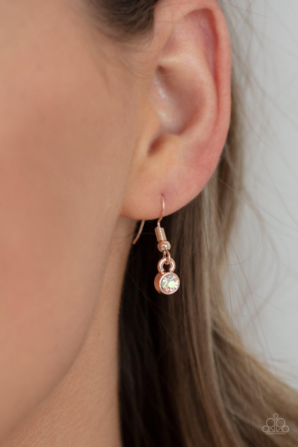 Cosmic Countess Rose Gold and Iridescent Rhinestone Necklace - Paparazzi Accessories - free matching earrings -CarasShop.com - Paparazzi Jewelry by Cara Jewels