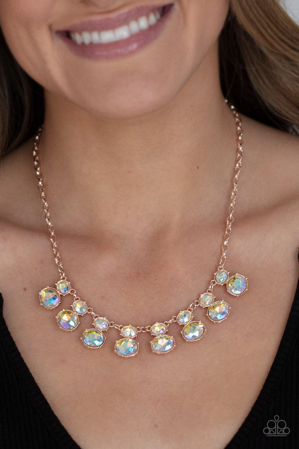Cosmic Countess Rose Gold and Iridescent Rhinestone Necklace - Paparazzi Accessories- on model - CarasShop.com - Paparazzi Jewelry by Cara Jewels