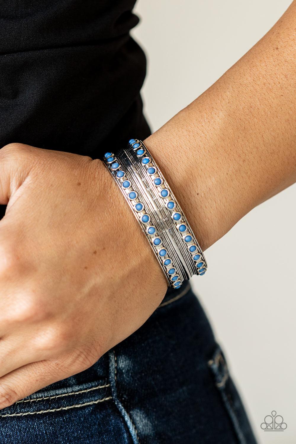 Costa Rica Retreat Blue & Silver Cuff Bracelet - Paparazzi Accessories- on model - CarasShop.com - Paparazzi Jewelry by Cara Jewels