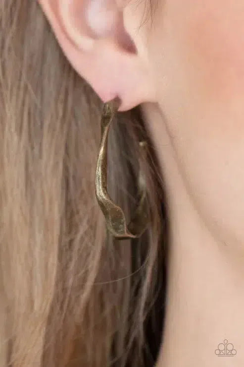 Coveted Curves Brass Hoop Earrings - Paparazzi Accessories- on model - CarasShop.com - Paparazzi Jewelry by Cara Jewels