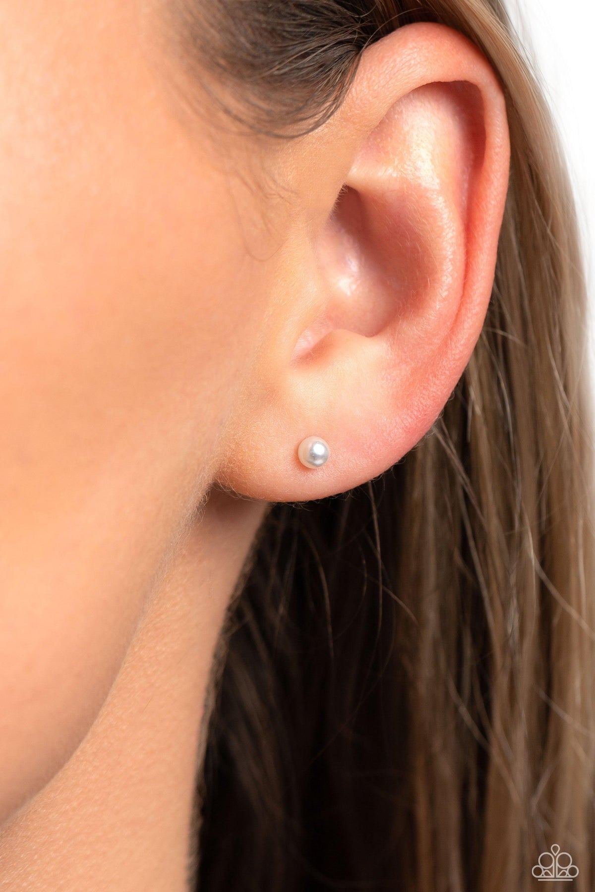 Dainty Details White Pearl Stud Earrings - Paparazzi Accessories- on model - CarasShop.com - Paparazzi Jewelry by Cara Jewels