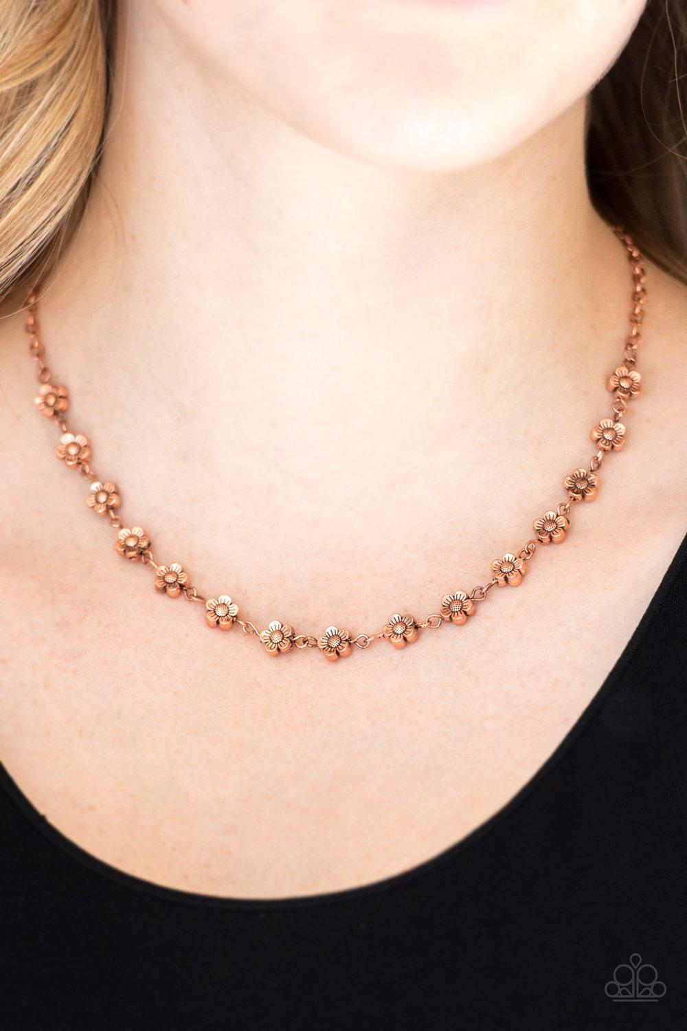 Daisy Do-Si-Do Copper Flower Necklace - Paparazzi Accessories- on model - CarasShop.com - Paparazzi Jewelry by Cara Jewels