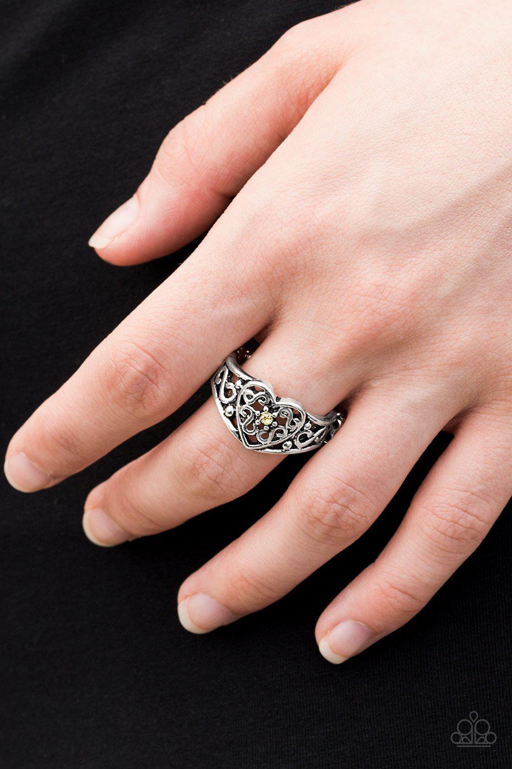 Dearly Beloved Silver and Yellow Heart Ring - Paparazzi Accessories- on model - CarasShop.com - Paparazzi Jewelry by Cara Jewels