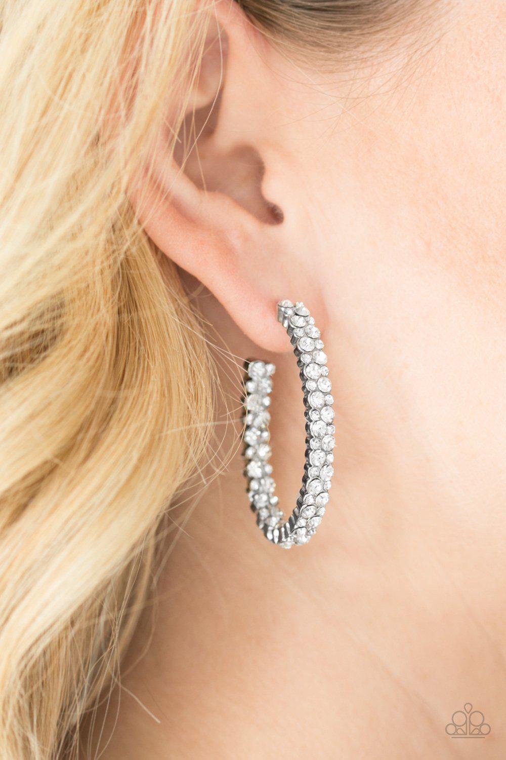 Debonaire Dazzle White Rhinestone Hoop Earrings - Paparazzi Accessories- on model - CarasShop.com - Paparazzi Jewelry by Cara Jewels