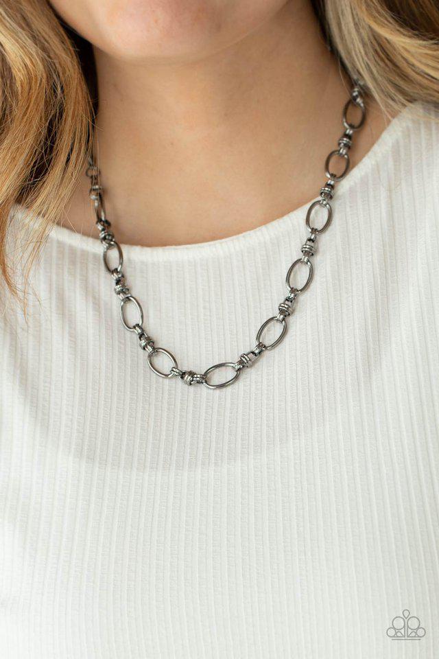 Defined Drama Gunmetal Black Chain Necklace - Paparazzi Accessories- on model - CarasShop.com - Paparazzi Jewelry by Cara Jewels