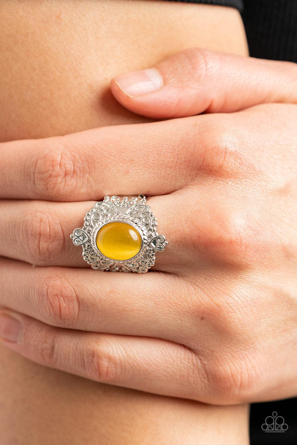 Delightfully Dreamy Yellow Cat's Eye Stone Ring - Paparazzi Accessories- on model - CarasShop.com - Paparazzi Jewelry by Cara Jewels