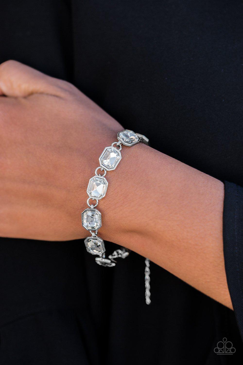 Delux Sparkle White Rhinestone Bracelet - Paparazzi Accessories- on model - CarasShop.com - Paparazzi Jewelry by Cara Jewels