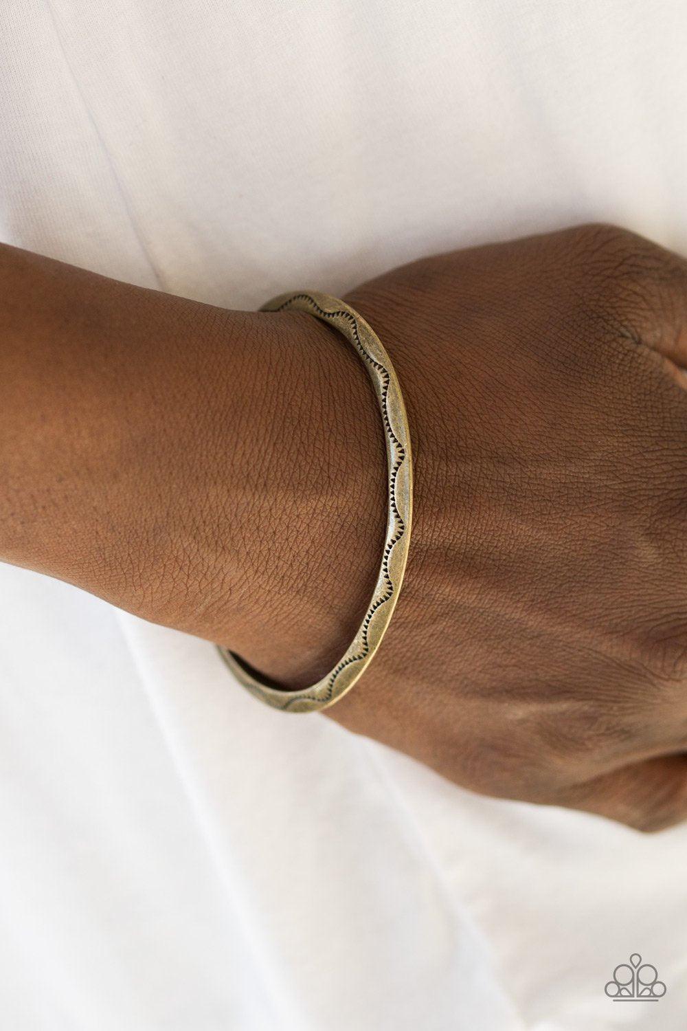 Desert Charmer Brass Cuff Bracelet - Paparazzi Accessories- on model - CarasShop.com - Paparazzi Jewelry by Cara Jewels