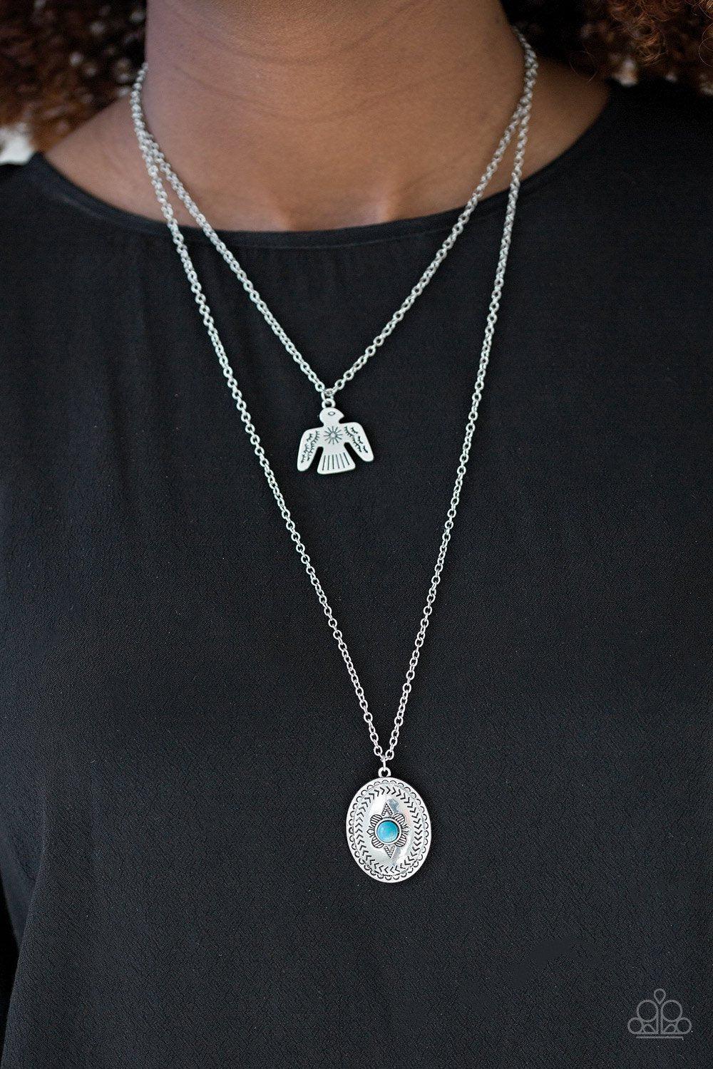 Desert Eagle Silver and Turquoise Blue Stone Necklace - Paparazzi Accessories- on model - CarasShop.com - Paparazzi Jewelry by Cara Jewels