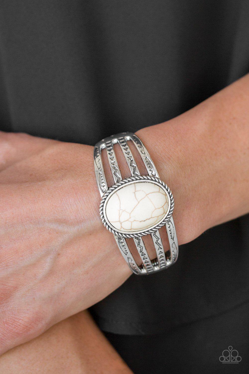 Desert Glyphs White Stone Hinged Cuff Bracelet - Paparazzi Accessories- on model - CarasShop.com - Paparazzi Jewelry by Cara Jewels