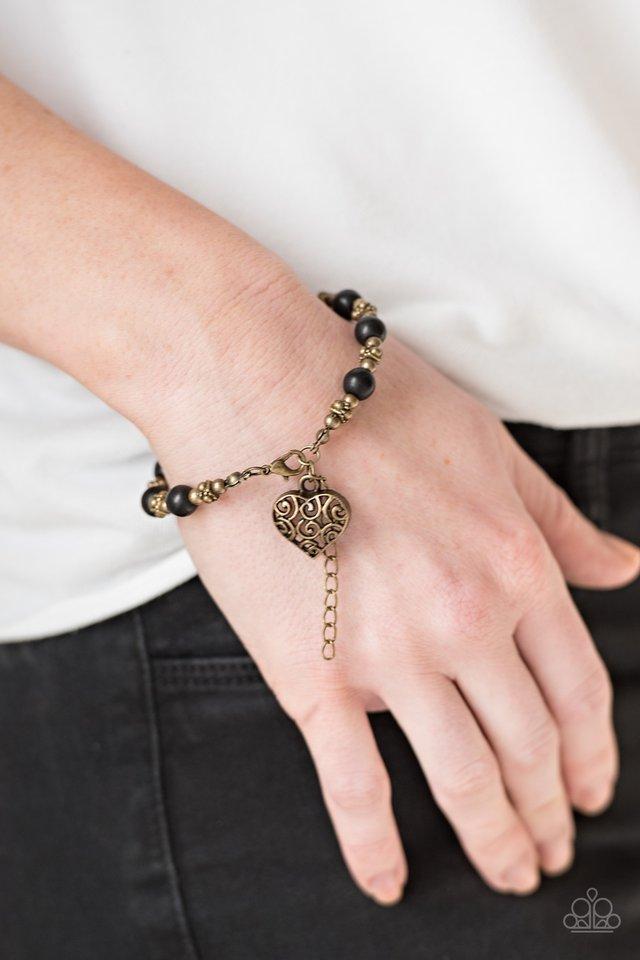 Desert Heartthrob Brass Heart Bracelet - Paparazzi Accessories- on model - CarasShop.com - Paparazzi Jewelry by Cara Jewels