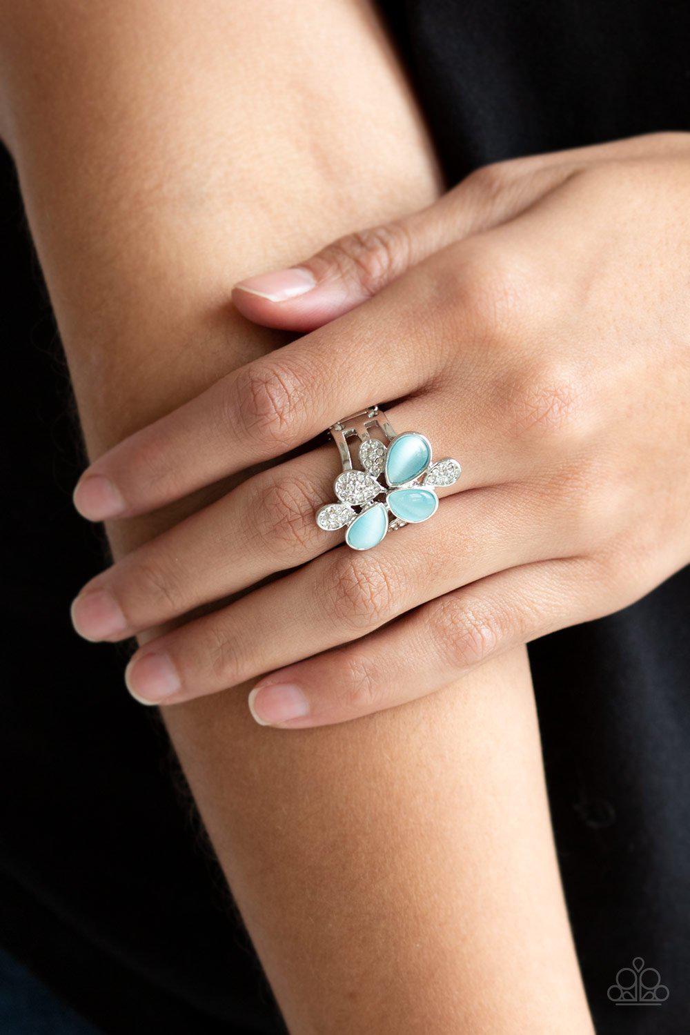 Diamond Daisies Blue Moonstone and White Rhinestone Ring - Paparazzi Accessories- on model - CarasShop.com - Paparazzi Jewelry by Cara Jewels