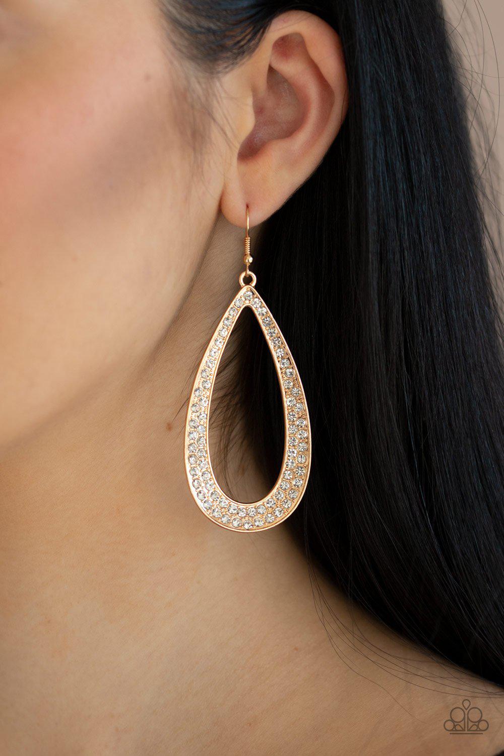 Diamond Distraction Gold and White Rhinestone Teardrop Earrings - Paparazzi Accessories- on model - CarasShop.com - Paparazzi Jewelry by Cara Jewels