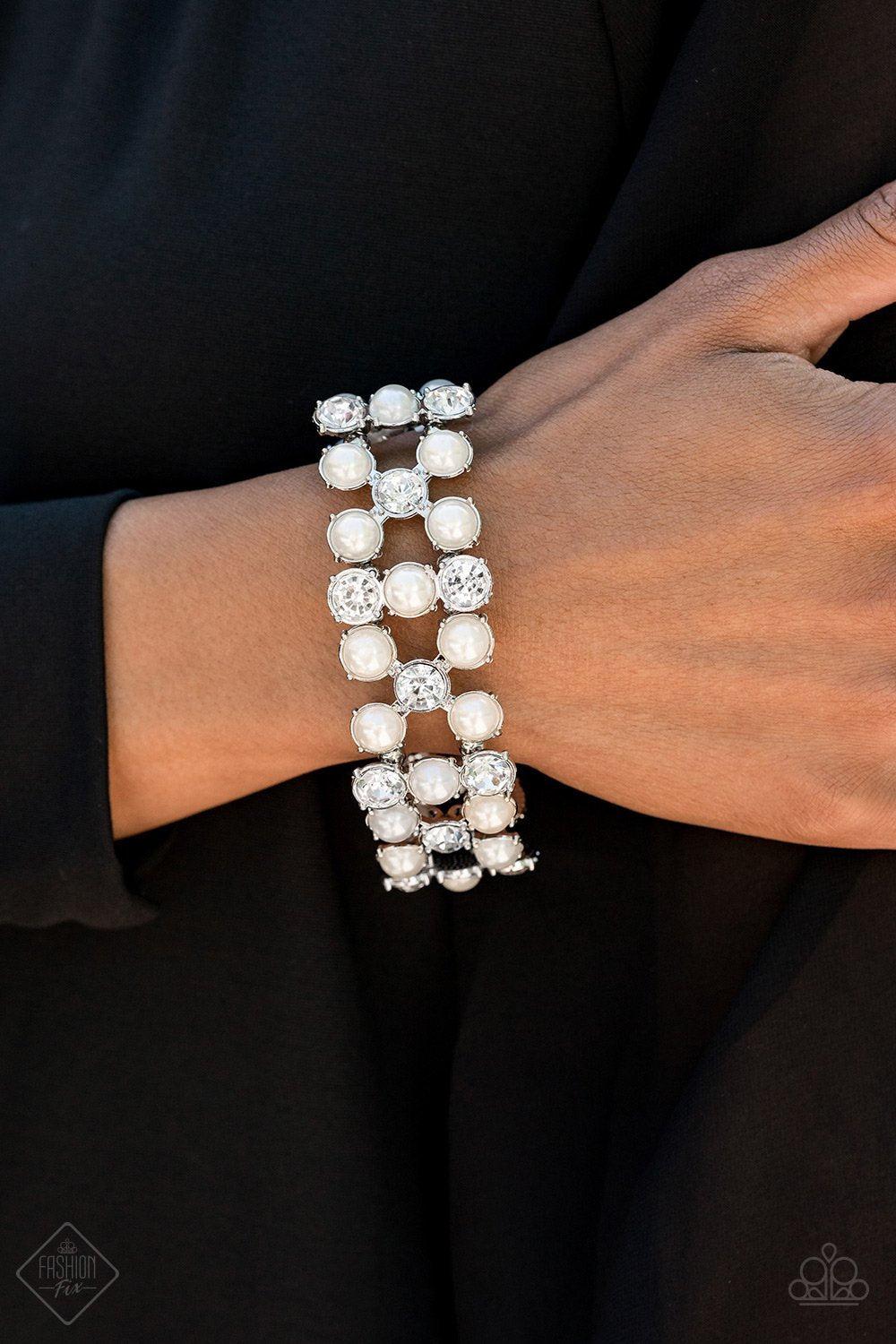 Diamonds and Debutantes White Pearl and Rhinestone Stretch Cuff Bracelet - Paparazzi Accessories- on model - CarasShop.com - Paparazzi Jewelry by Cara Jewels