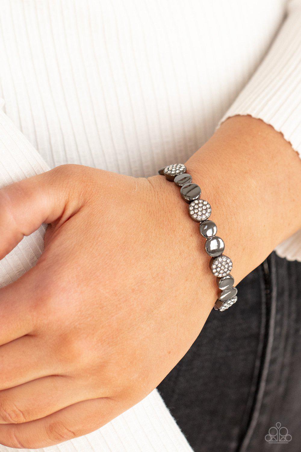 Dimensional Dazzle Gunmetal Black and White Rhinestone Bracelet - Paparazzi Accessories- on model - CarasShop.com - Paparazzi Jewelry by Cara Jewels