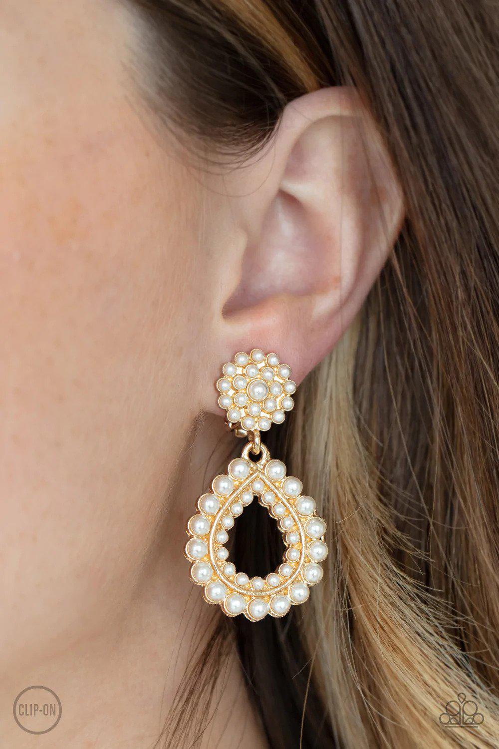 Discerning Droplets Gold & White Pearl Clip-on Earrings - Paparazzi Accessories- on model - CarasShop.com - Paparazzi Jewelry by Cara Jewels