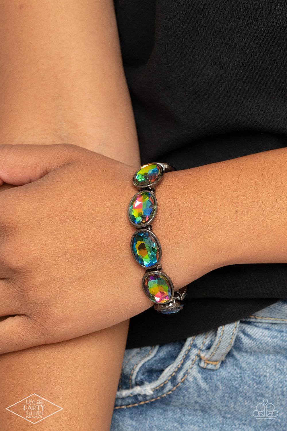 Diva In Disguise Multi Oil Spill Rhinestone Bracelet - Paparazzi Accessories- on model - CarasShop.com - Paparazzi Jewelry by Cara Jewels