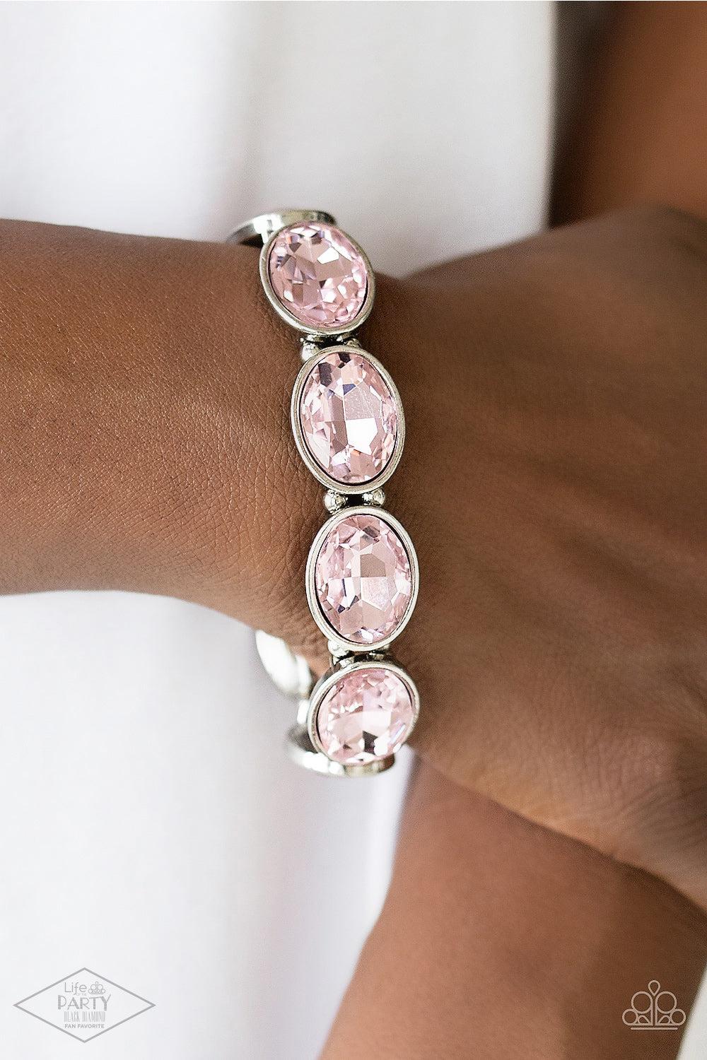 DIVA In Disguise Pink Rhinestone Bracelet - Paparazzi Accessories- on model - CarasShop.com - Paparazzi Jewelry by Cara Jewels