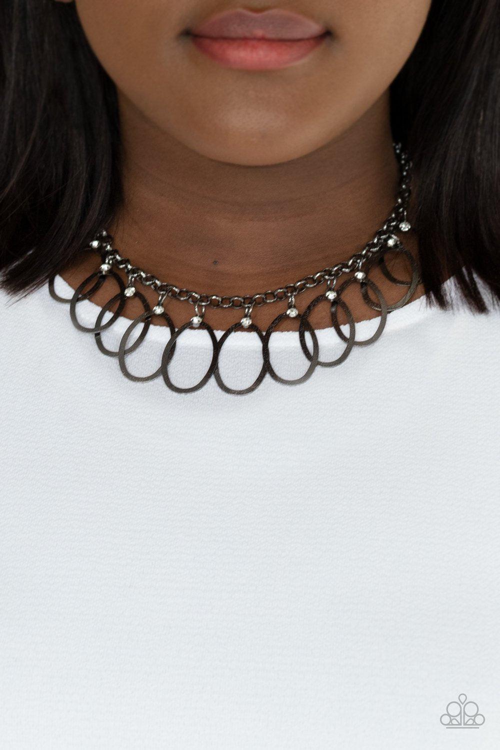 Double OVAL-time Gunmetal Black and White Rhinestone Necklace - Paparazzi Accessories- on model - CarasShop.com - Paparazzi Jewelry by Cara Jewels