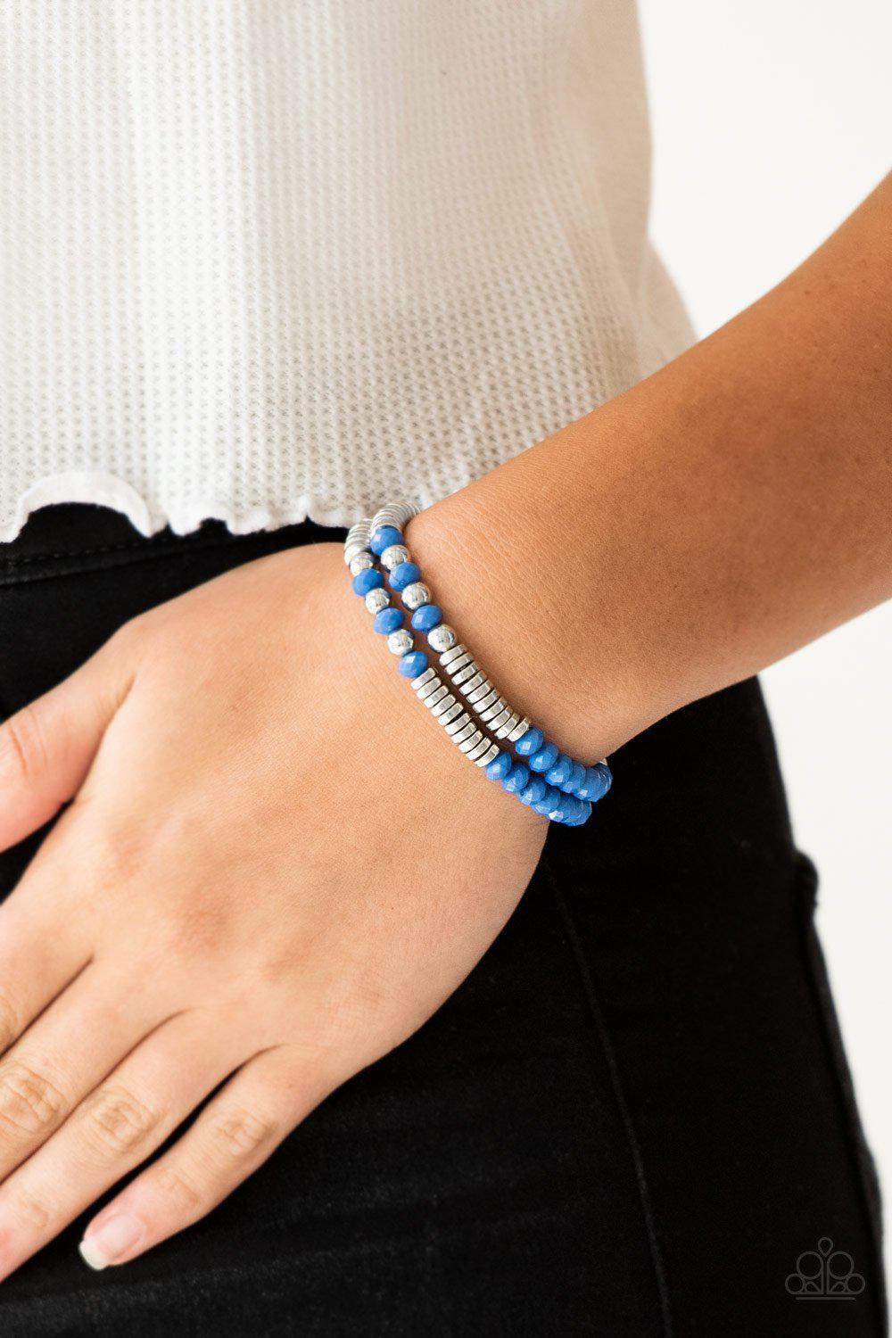 Downright Dressy Blue and Silver Stretch Bracelet Set - Paparazzi Accessories- on model - CarasShop.com - Paparazzi Jewelry by Cara Jewels