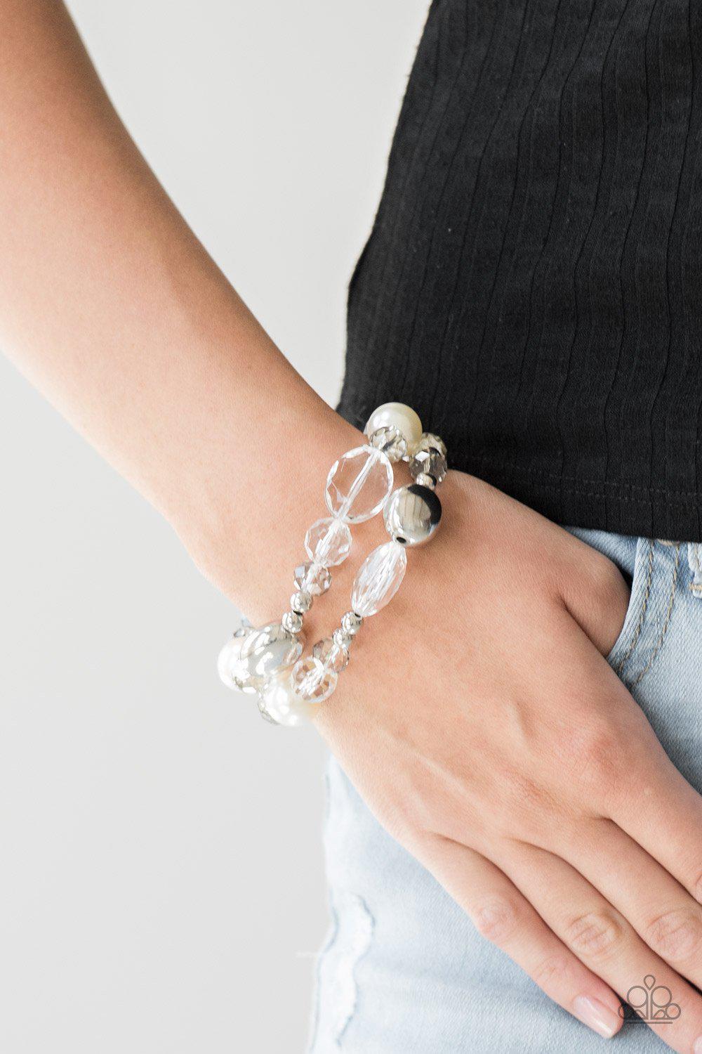 Downtown Dazzle Silver and White Bracelet Set - Paparazzi Accessories- on model - CarasShop.com - Paparazzi Jewelry by Cara Jewels