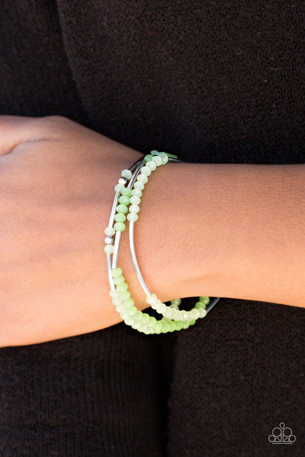 Dream Gleam Green and Silver Stretch Bracelet Set - Paparazzi Accessories- on model - CarasShop.com - Paparazzi Jewelry by Cara Jewels